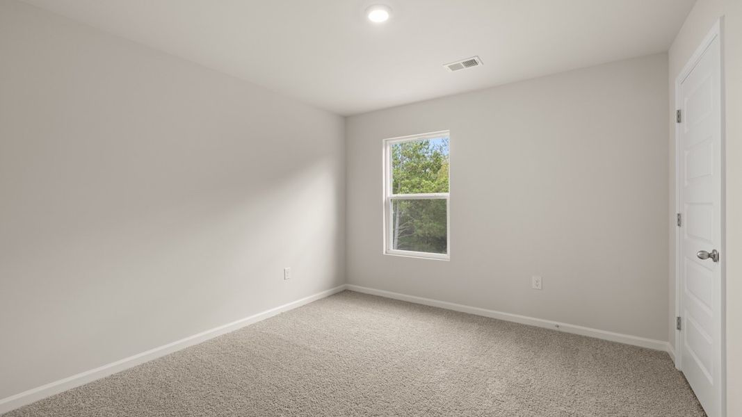 Spacious, unfurnished interior of a new home in Preserve at Dove Creek, Statham (Image 26).