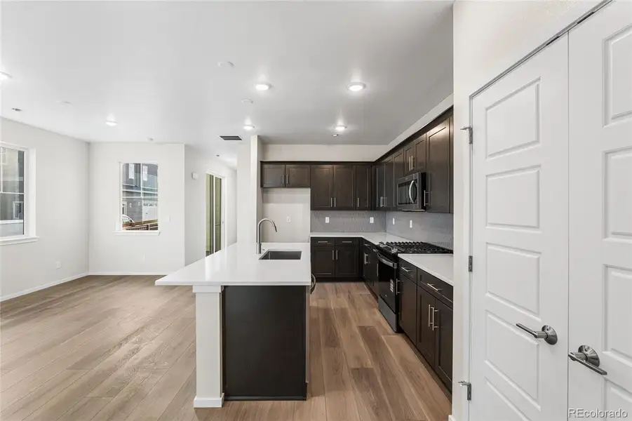 Furnished interior view inside a new home in Barefoot Village, Firestone (Image 11).