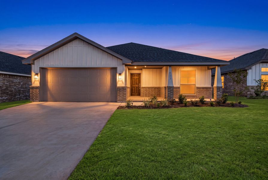 Front exterior of a new home in Craftsman's Corner, Cleburne, TX, highlighting curb appeal (Image 24).