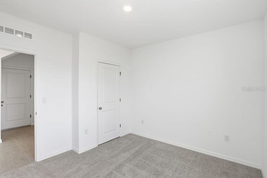 Spacious, unfurnished interior of a new home in Waterstone, Groveland (Image 28).