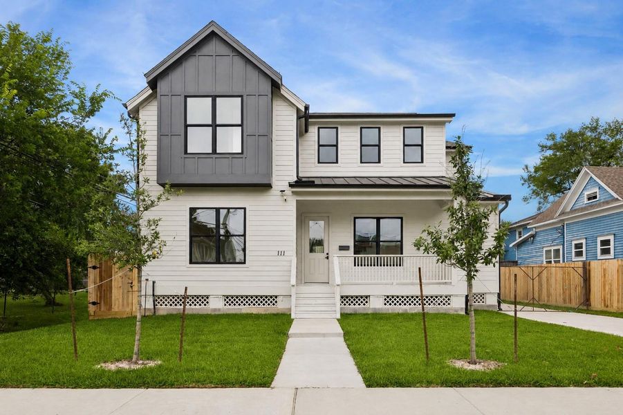 This newly constructed residence blends clean contemporary design with oversized windows, contrasting exterior finishes, and a covered front porch. Positioned just off Heights Boulevard, the home offers convenient access to neighborhood trails, restaurants, and nearby Marmion Park.