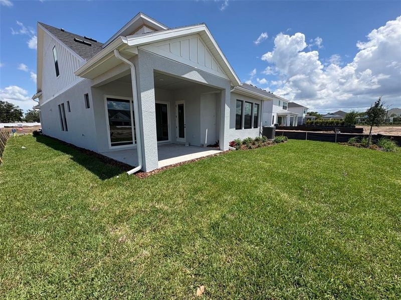 Exterior details and patio area of a home in Lakeview Crossing – Tradition Series, Sarasota (Image 17). Exterior details and patio area of a home in Lakeview Crossing – Tradition Series, Sarasota (Image 17).