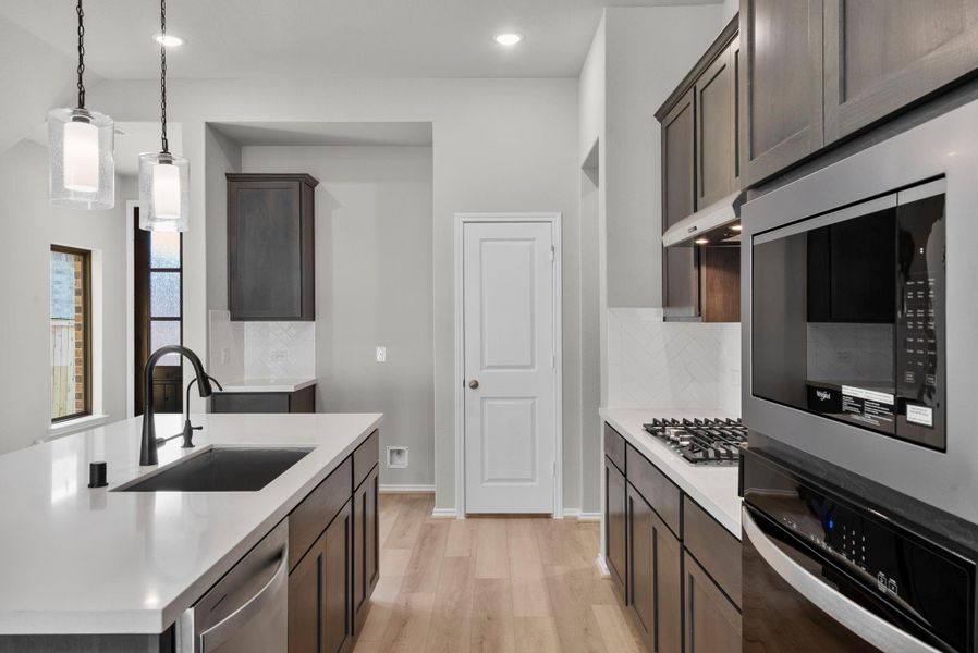 Furnished interior view inside a new home in Grand Central Park, Conroe (Image 9).