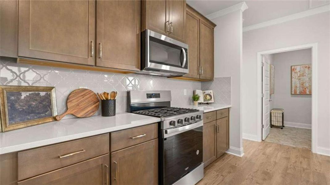Furnished interior view inside a new home in Oak Ridge Meadows - Active Adult, Locust Grove (Image 14).
