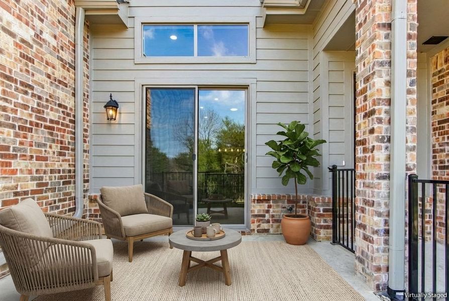 Exterior details and patio area of a home in Cottonwood Creek, Rowlett (Image 4).
