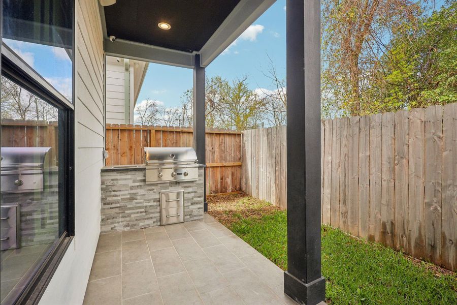Exterior details and patio area of a home in , Houston (Image 2). Exterior details and patio area of a home in , Houston (Image 2).