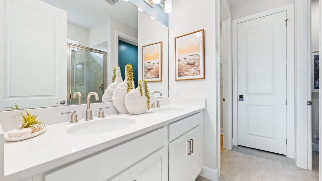 Representative furnished interior of a home built from the Alta by Taylor Morrison in Esplanade at Wellen Park, Englewood (Image 14).