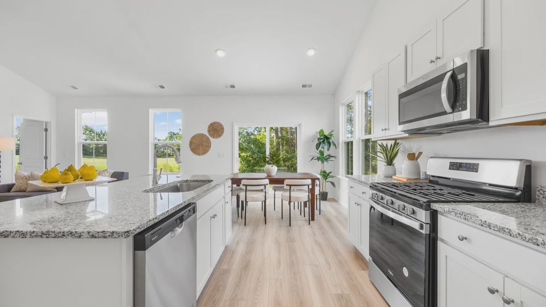 Furnished interior view inside a new home in Bluffs at Sun Colony, Longs (Image 8).