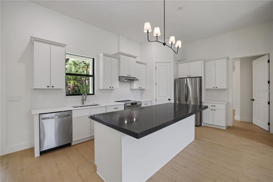 Furnished interior view inside a new home in , Port Charlotte (Image 7).