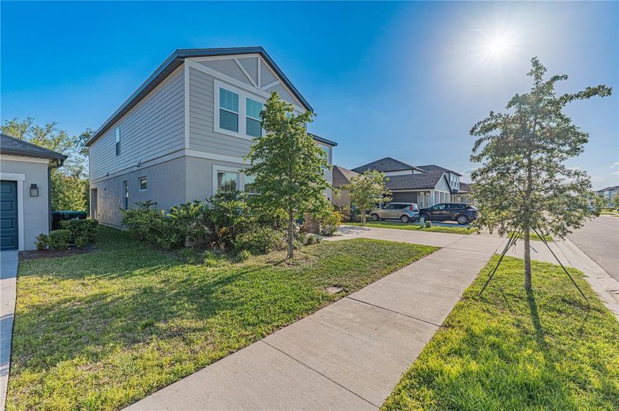 Front exterior of a new home in , Orlando, FL, highlighting curb appeal (Image 15). Front exterior of a new home in , Orlando, FL, highlighting curb appeal (Image 15).