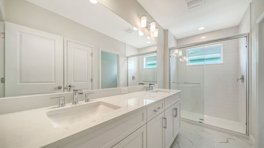 Furnished interior view inside a new home in Palm Grove Real Estate and Homes for Sale in Lakewood Ranch, FL - Neal Communities, Bradenton (Image 5).