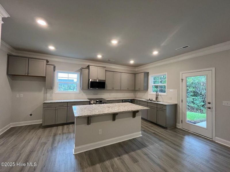 Furnished interior view inside a new home in Palmetto Creek, Bolivia (Image 6).