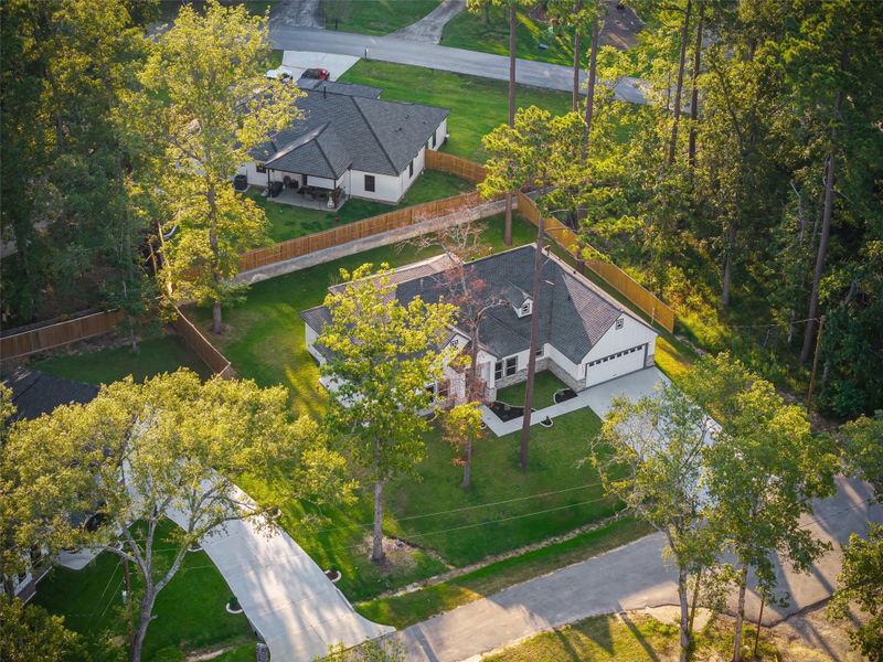 Front exterior of a new home in , Conroe, TX, highlighting curb appeal (Image 19).