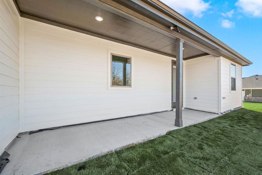 Front exterior of a new home in Saddleback Estates, Boyd, TX, highlighting curb appeal (Image 19).