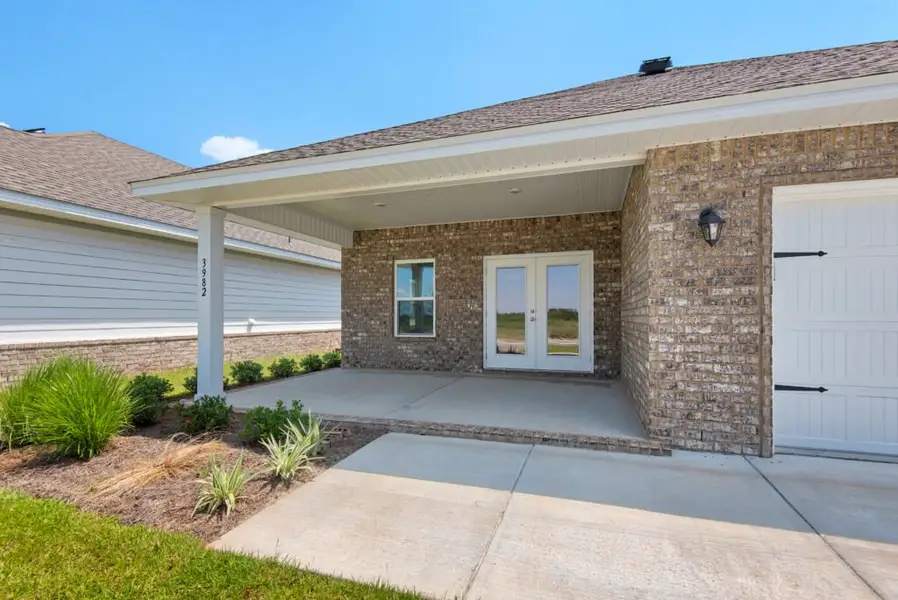 Exterior details and patio area of a home in Yellow River Ranch, Milton (Image 3). Exterior details and patio area of a home in Yellow River Ranch, Milton (Image 3).