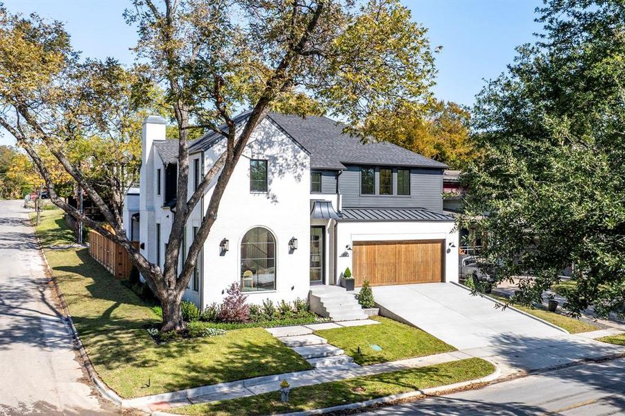 Front exterior of a new home in , Dallas, TX, highlighting curb appeal (Image 2).