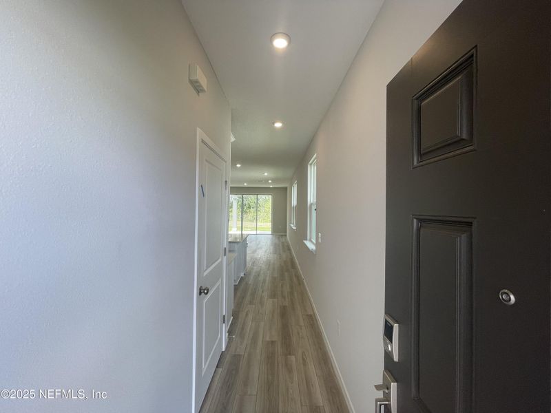 Spacious, unfurnished interior of a new home in Palm Series at Seminole Palms, Palm Coast (Image 32).