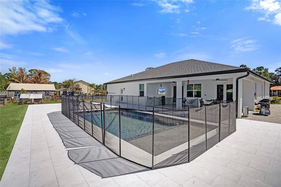 Exterior details and patio area of a home in , Loxahatchee (Image 38).