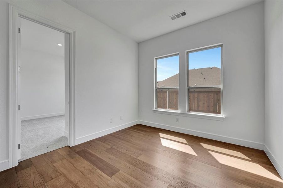 Spacious, unfurnished interior of a new home in Wellington, Haslet (Image 25).