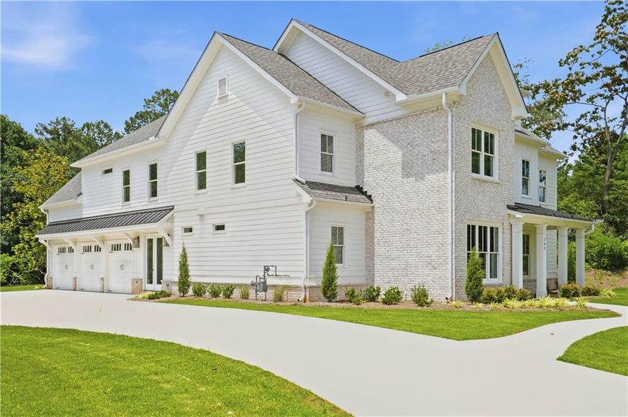 Front exterior of a new home in , Marietta, GA, highlighting curb appeal (Image 2). Front exterior of a new home in , Marietta, GA, highlighting curb appeal (Image 2).