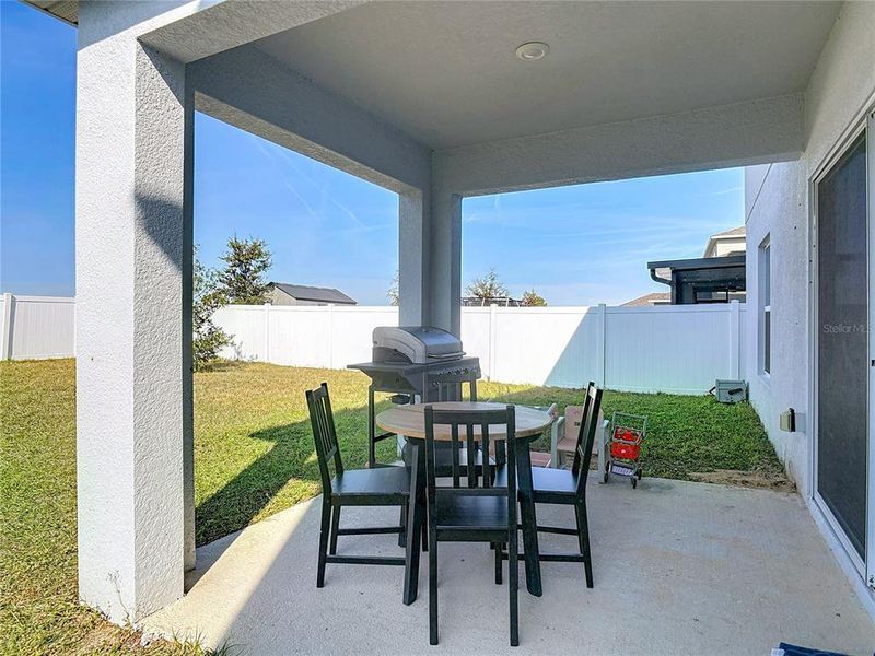 Exterior details and patio area of a home in Parkside at Cherry Lake, Groveland (Image 24).