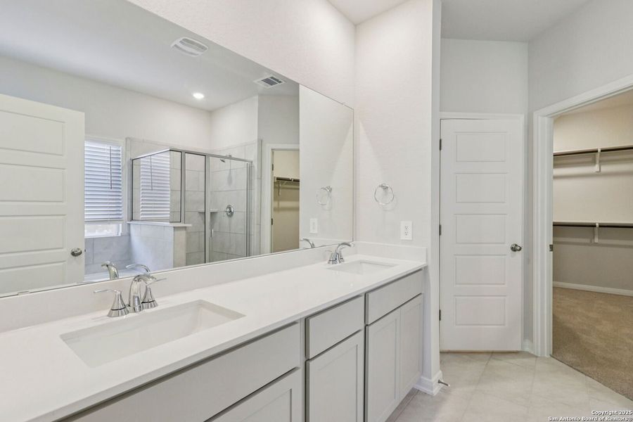 Furnished interior view inside a new home in Estancia Ranch - Premier Series, San Antonio (Image 11). Furnished interior view inside a new home in Estancia Ranch - Premier Series, San Antonio (Image 11).