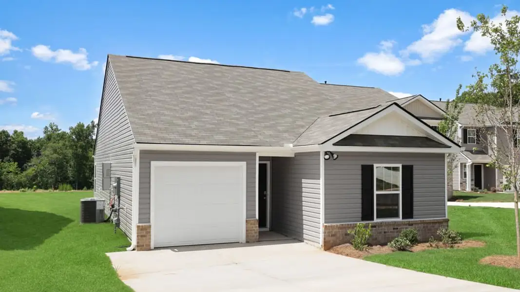Front exterior of a new home in Harper Ridge, Roebuck, SC, highlighting curb appeal (Image 2). Front exterior of a new home in Harper Ridge, Roebuck, SC, highlighting curb appeal (Image 2).