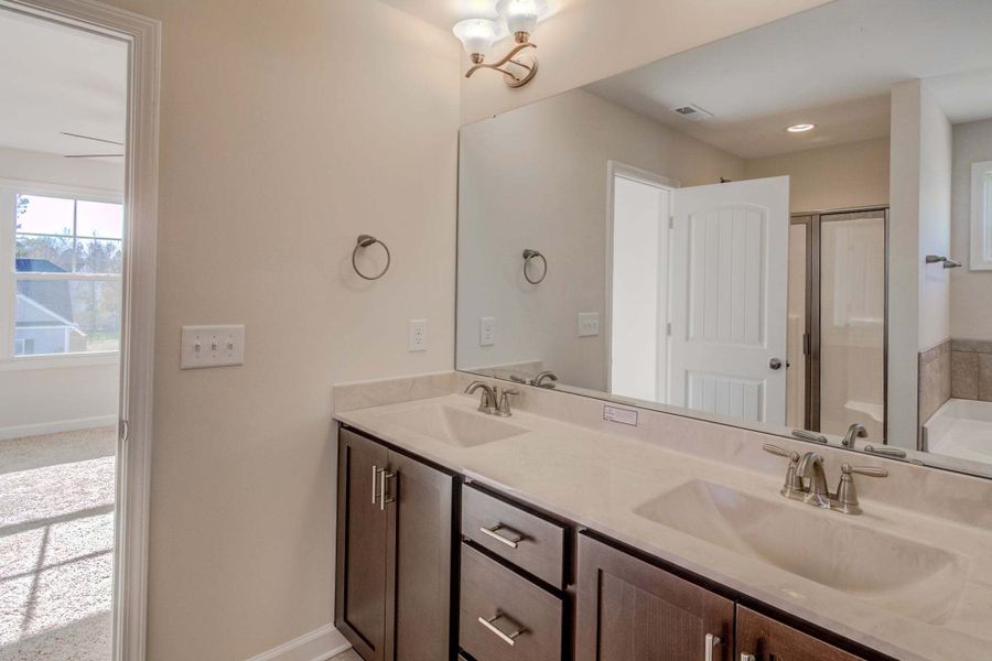 Representative furnished interior of a home built from the Drayton by Caviness & Cates Communities in Bartlett Manor, Youngsville (Image 215).