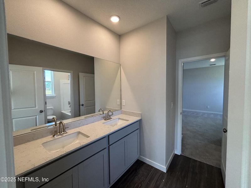 Furnished interior view inside a new home in The Cypress Series at Reserve East, Flagler Beach (Image 8).
