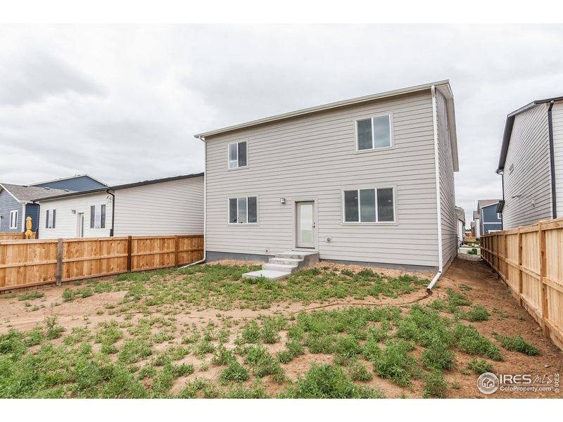 Exterior details and patio area of a home in Granary Trailblazer Collection - Single Family Homes, Johnstown (Image 3).