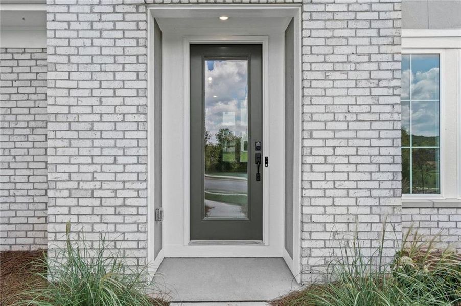 Exterior details and patio area of a home in Twin Lakes, Hoschton (Image 4).