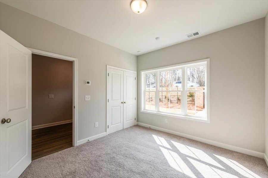 Spacious, unfurnished interior of a new home in Wilkins Walk, Mableton (Image 13).