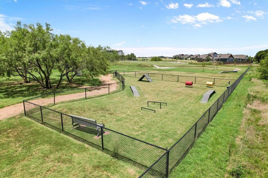 View of property's community area featuring a dog friendly park area and a walking trail.