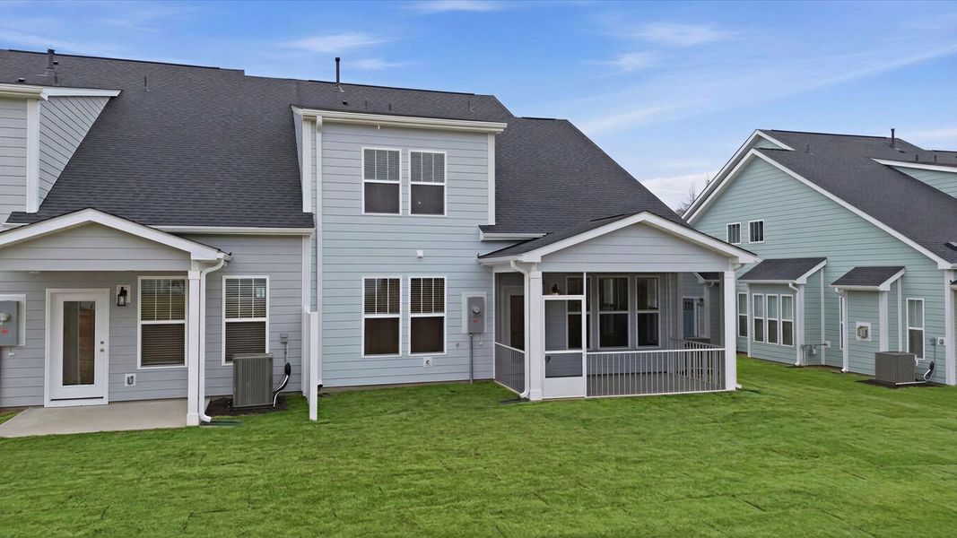 Exterior details and patio area of a home in Village at Midway, Anderson (Image 22).