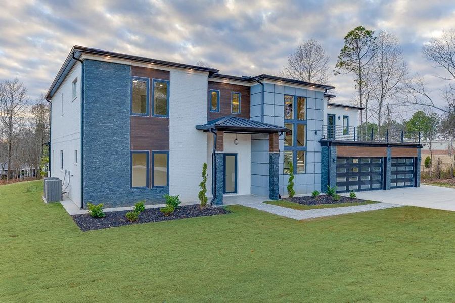 Front exterior of a new home in , Buford, GA, highlighting curb appeal (Image 31).
