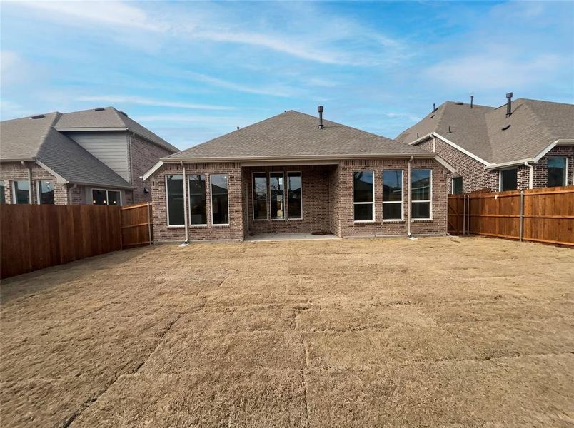 Exterior details and patio area of a home in Shaded Tree, McKinney (Image 3).
