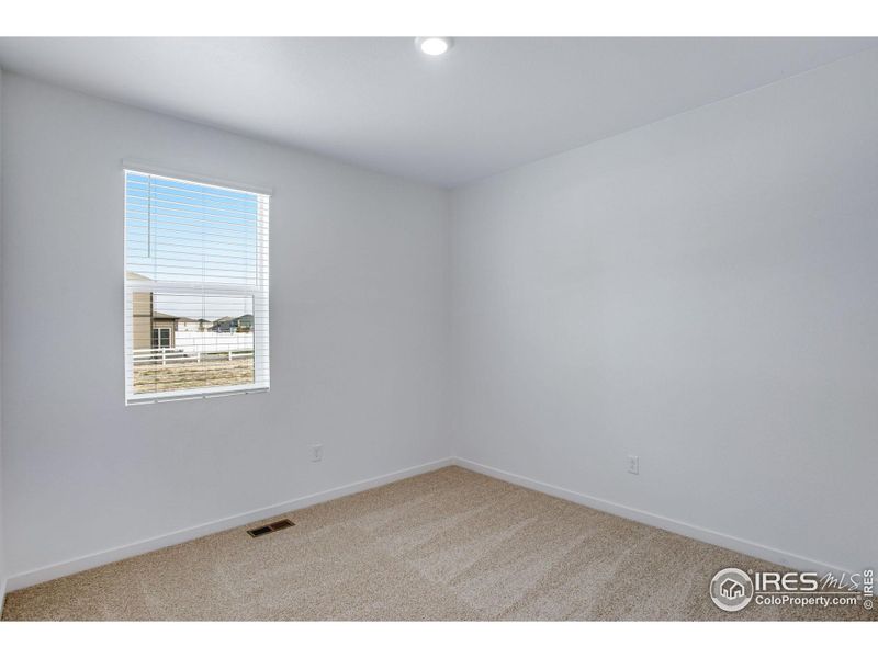 Spacious, unfurnished interior of a new home in Hansen Farm, Fort Collins (Image 28).