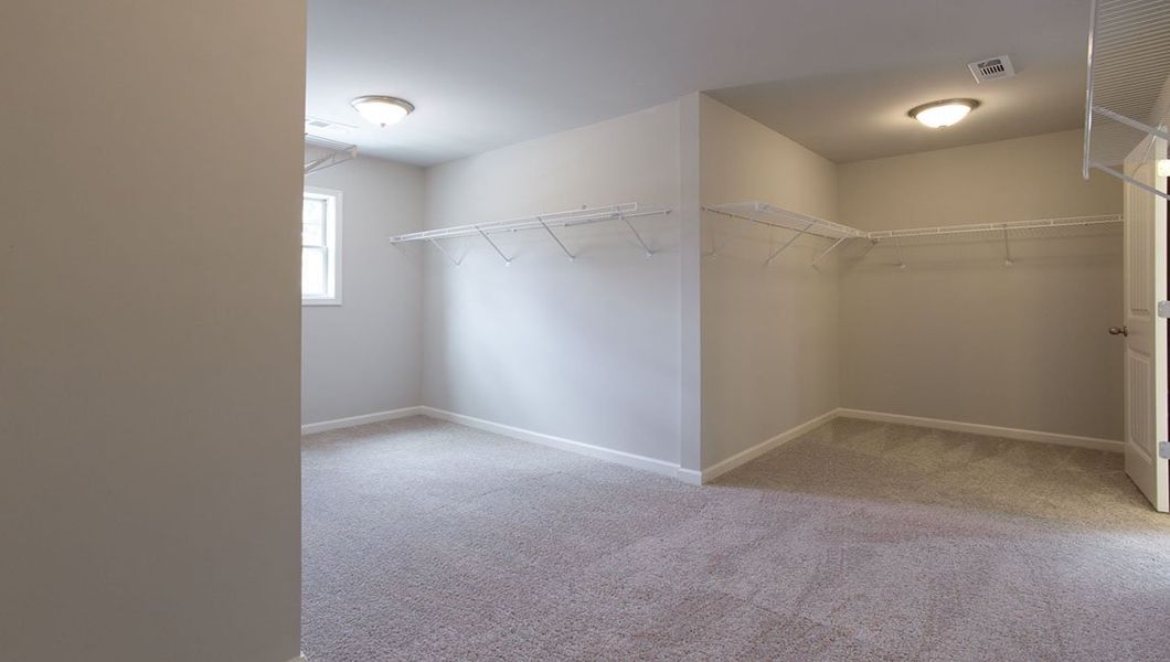 Representative unfurnished interior of a home built from the Edinburgh by D.R. Horton in Thalley Creek Estates, Cumming (Image 28).