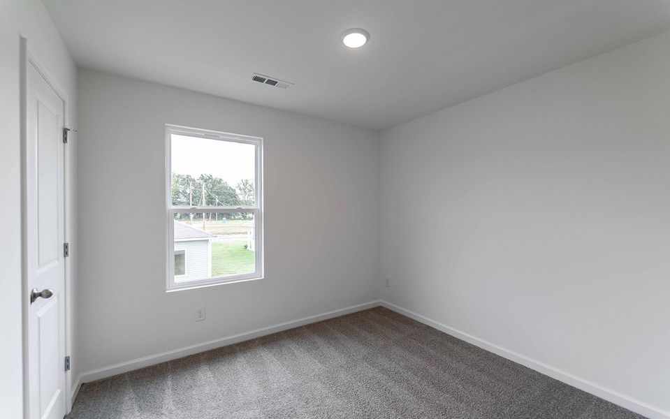 Spacious, unfurnished interior of a new home in Stonehenge, Manchester (Image 33).