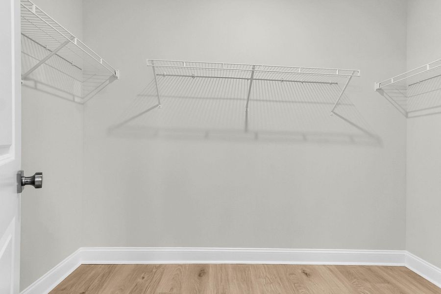 Spacious, unfurnished interior of a new home in Tidewater at Lakes of Cane Bay, Summerville (Image 28).