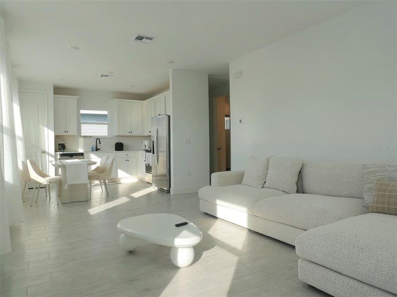 Furnished interior view inside a new home in Laureate Park, Orlando (Image 8).