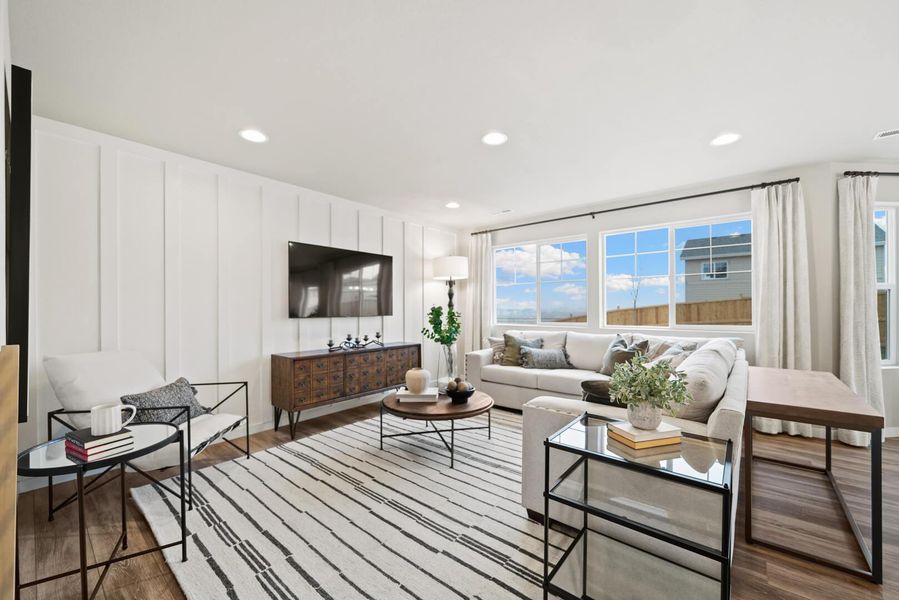 Representative furnished interior of a home built from the The Bellhaven by Challenger Homes in Sky Ranch - Highland Collection, Watkins (Image 9).
