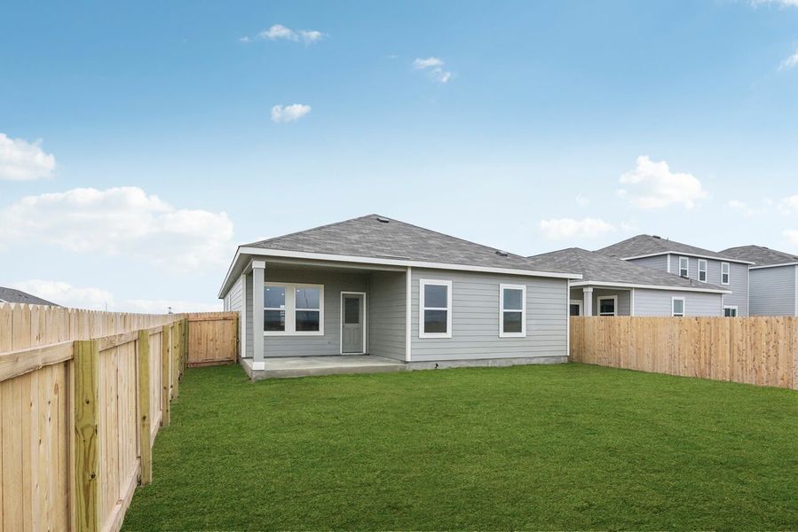 Representative exterior photo of a completed home built from the Sterling by Starlight Homes in Sunset Oaks, Maxwell, TX (Image 12).