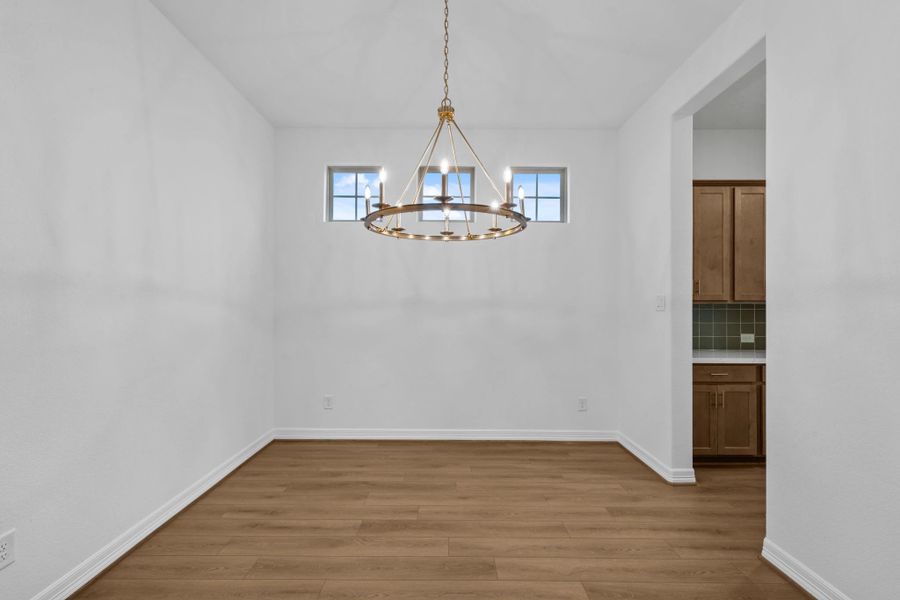 Dining space. Sample product photo. Actual exterior and interior selections may vary by homesite. Photo may be virtually staged.