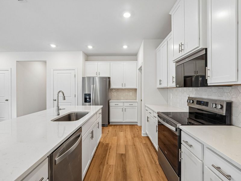 Furnished interior view inside a new home in Walnut Reserve, Conover (Image 4).