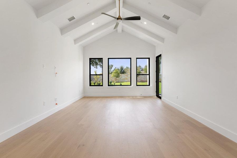 Spacious, unfurnished interior of a new home in Milky Way at River Place, Austin (Image 35).