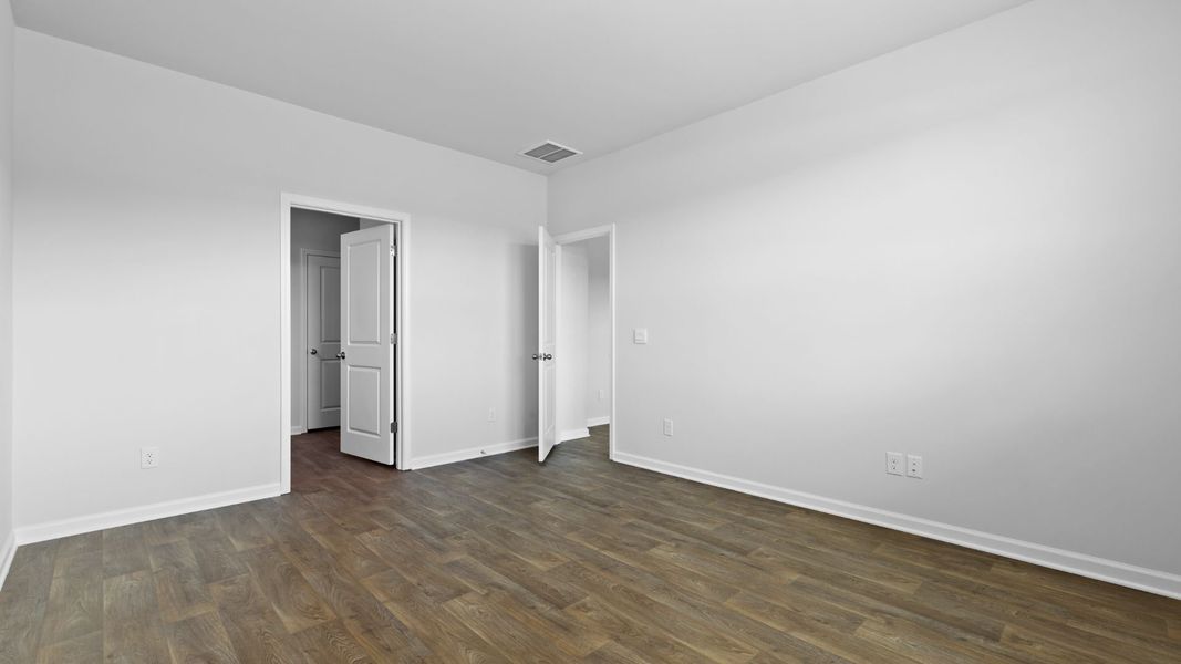 Spacious, unfurnished interior of a new home in Pine Hills at Cane Bay, Summerville (Image 17).