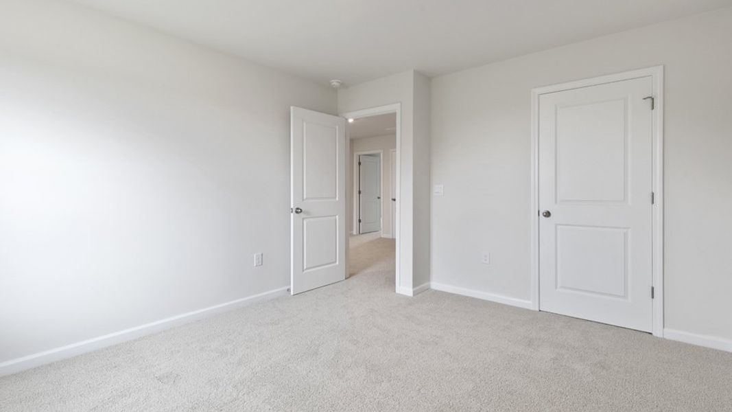 Spacious, unfurnished interior of a new home in Villa Grande, Winterville (Image 28).