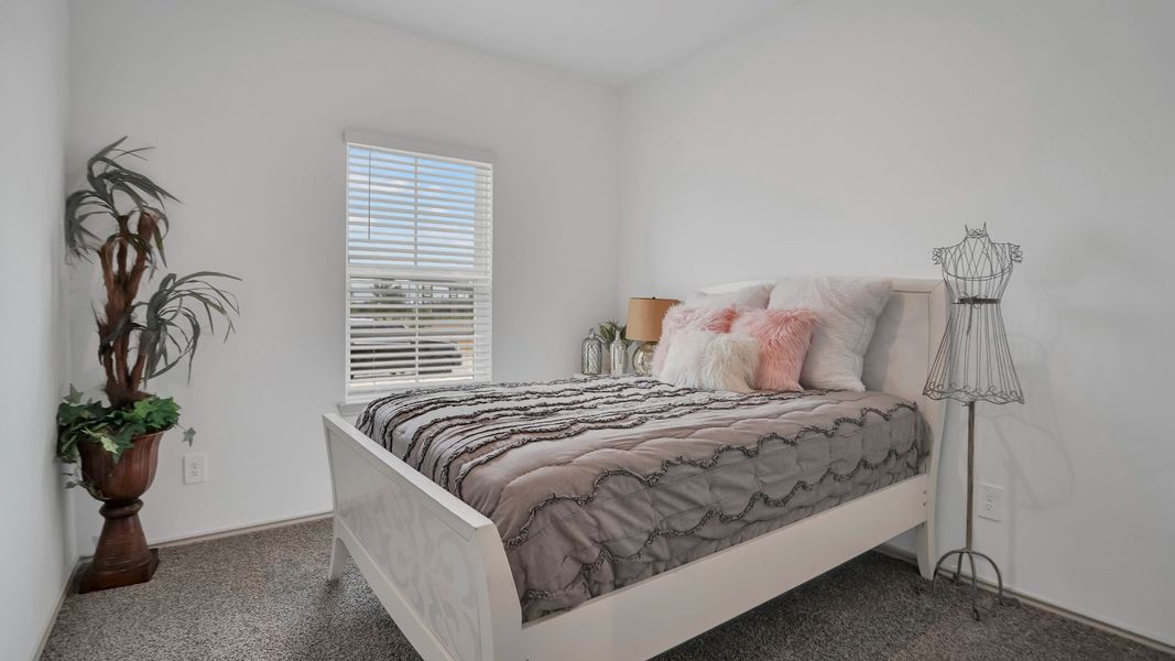 Representative furnished interior of a home built from the MITCHELL by D.R. Horton in Westward Pointe, Sealy (Image 15).
