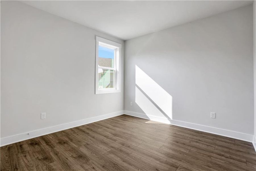 Spacious, unfurnished interior of a new home in The Paddocks at Doc Hughes, Buford (Image 21).